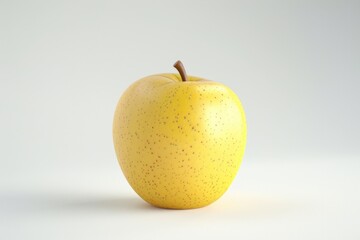A single yellow apple sits on a clean and simple white surface