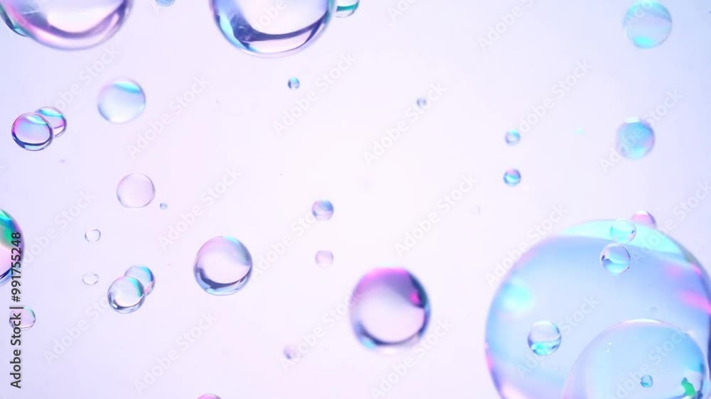 Poster this montage of six frames showcases colorful soap bubbles floating on a pristine white background. 