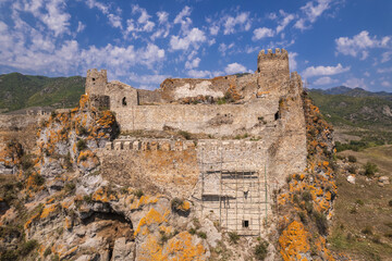 Ancient cliffside fortress ruins