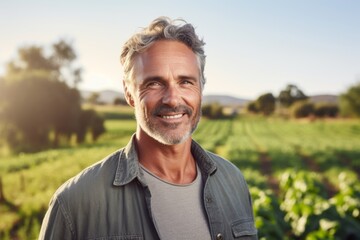 Portrait of a smiling middle aged Caucasian man on farm