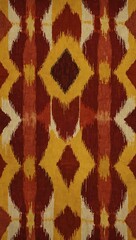 Vibrant rhombus ikat pattern in red and yellow.