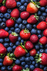 many small berries and strawberries background
