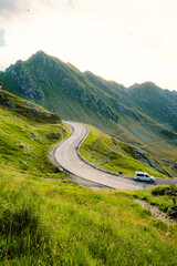 Fagaras mountains with Transfagarasan serpentine road in Sibiu County, Romania. Tansfaragasan road...