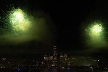 Obraz premium New York Manhattan fireworks. New York Fireworks over Manhattan. New York City 4th of July Fireworks. New York City Skyline Manhattan with Flashing Fireworks. Independence day.