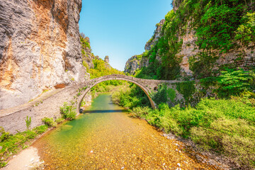 Kokkorou bridge, medieval stone bridge on river of Voidomatis, Pindus Mountains, Zagori, Greece.