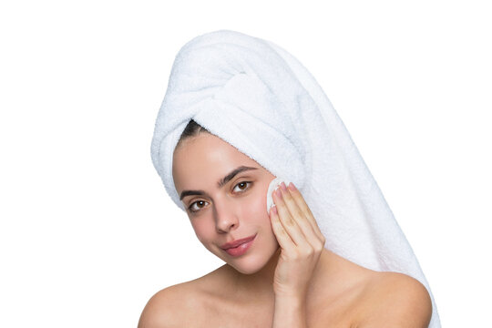 Skincare. Remove the makeup. Beauty routine. Woman in towel cleaning face skin. Cleansing skin with cotton ball. Skincare cosmetology. Beauty day in spa. Woman use cotton pad. Pore minimizer