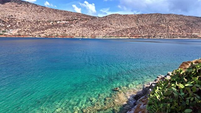 Natural lake surrounded with mountains in Crete island, panoramic view