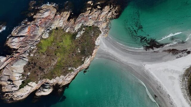 Diamond Island or Cod Rock, Tasmania in Australia. Aerial top-down view
