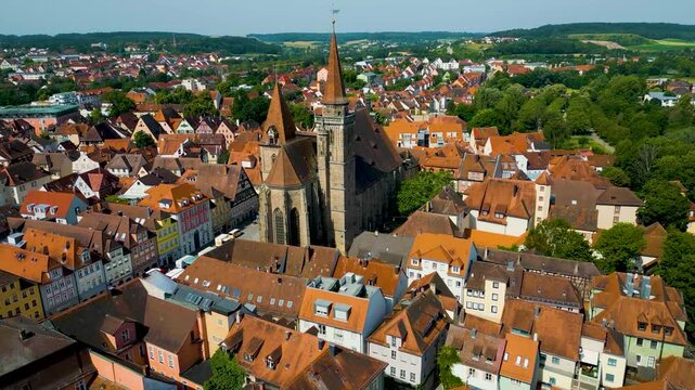 4K Aerial Drone Video of the Historic Half-Timbered Homes around the St. Johannis Kirche Church in Downtown Ansbach, Germany
