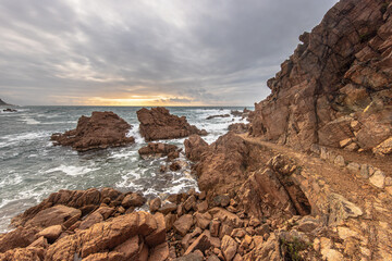 Trail through the Rocks on the coast of Mediterranean Sea