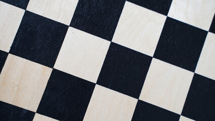 Fototapeta premium The texture of a wooden chessboard