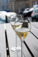 Tasting of brut and reserve grand cru champagne sparkling wine produced by traditional method in Mesnil-sur-Oger in Champagne, France