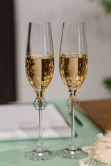 Elegant Toasting Flutes for Wedding Celebration with Sparkling Champagne and Delicate Decor