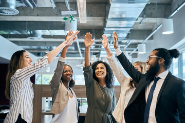 Happy business people, high five and reaching with team for winning, success or mission at office....