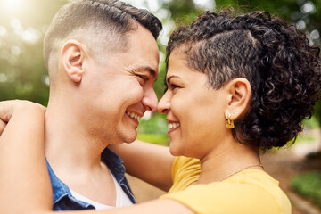 Couple, hug and eye contact with smile in park, summer and love with profile in sunshine by trees. Man, woman and happy with embrace, care and connection with bonding, trust and loyalty in Mexico