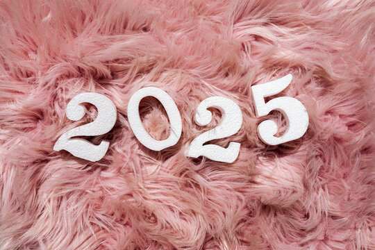 New year 2025 celebration on pink textured background