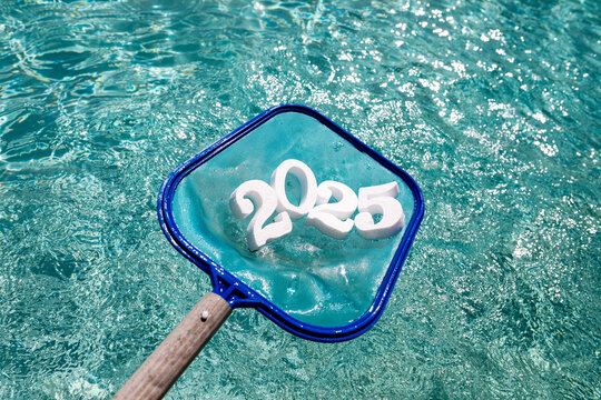 Celebrating the arrival of 2025 with numbers in a pool net