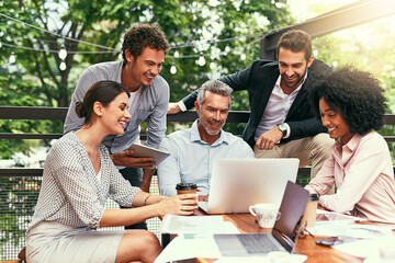 Laptop, business people and outdoor cafe with paperwork, teamwork and collaboration on balcony. Coffee shop, web and diversity with happy staff and chat with content creation planning and management