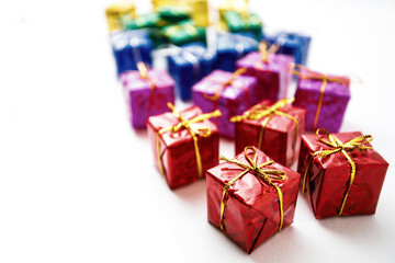Many colorful gift boxes on white background
