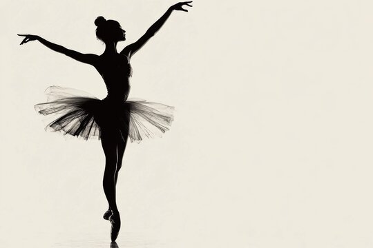 Fototapeta Silhouette of a young ballerina dancing gracefully in tutu dress