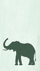 Obraz premium A serene elephant silhouette standing tall, with its trunk raised, set against a pale green background