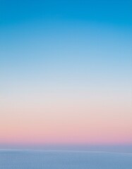 Fototapeta premium Serene Gradient Sky Over Textured Surface at Dawn/Dusk