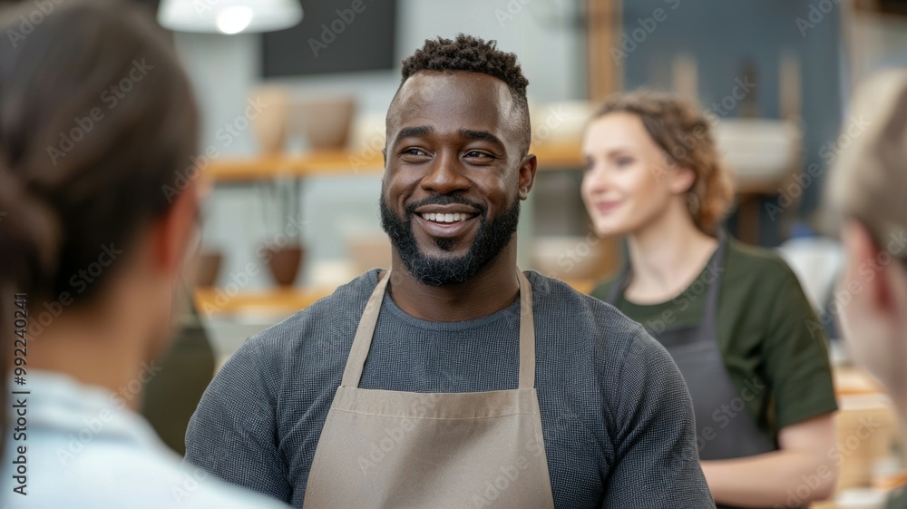 Poster a man with a beard and apron is smiling at the camera