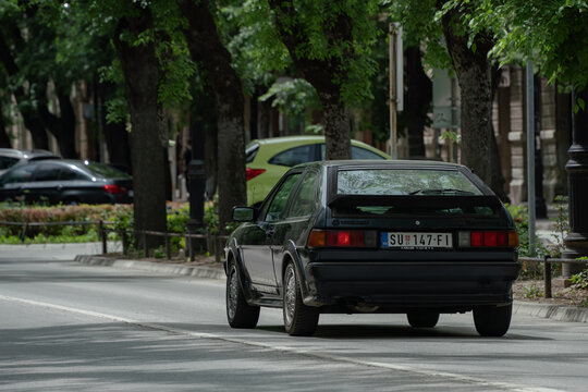 Volkswagen Scirocco sport coupe is driving down the street of Subotica, Serbia, 09.06.2024