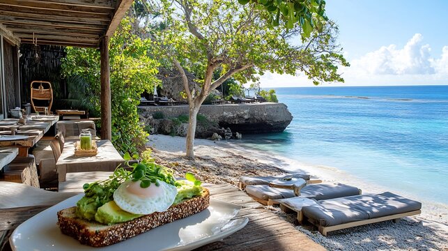 Avocado toast topped microgreens poached eggs served chic beachfront caf sun loungers tropical plants softly visible background promoting fresh nutritious breakfast Scientific name Persea americana