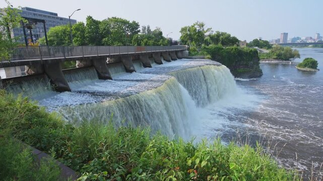 Rideau Falls on a warm summer morning flowing into the Ottawa River