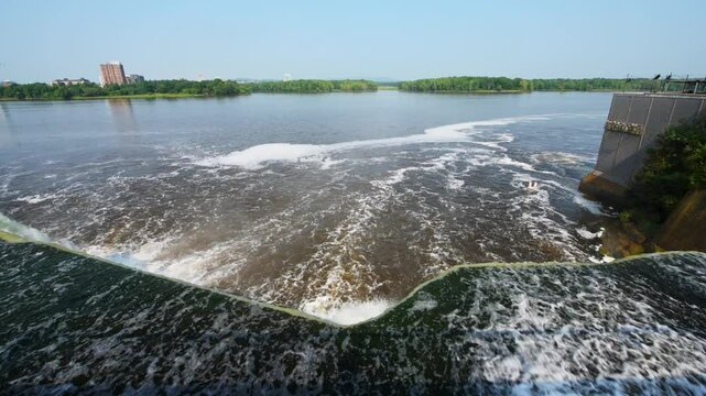 Rideau Falls on a warm summer morning flowing into the Ottawa River