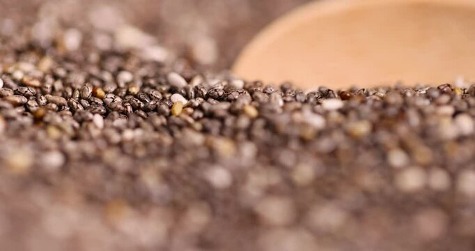black and white chia seeds for a healthy diet, a large number of chia seeds for adding to yogurts, desserts and other food products