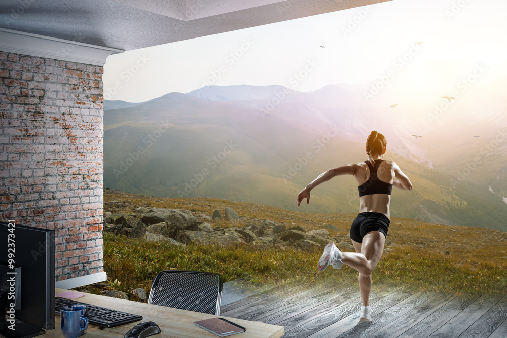 Wall mural woman running against natural landscape