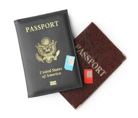 Passports and SIM cards isolated on white, top view