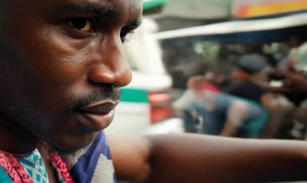 Kenyan Man Expertly Parallel Parking in Busy Urban Street