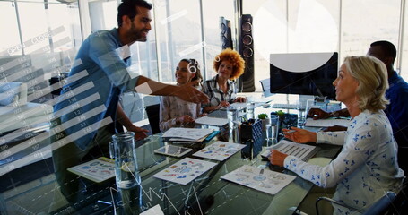 Image of financial data processing over diverse business people in office