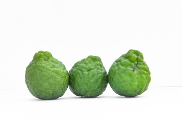 Citrus hystrix DC or kaffir lime or bergamot whole on isolated white background