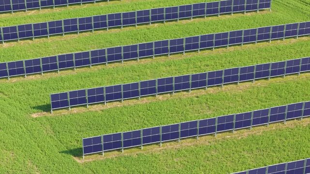 High angle view of east-west oriented bifacial solar park in Germany, high angle isolated drone view