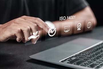 ISO 14001 concept, Identify, control and reduce the environmental impact of activities. Person...