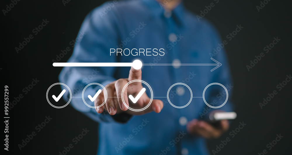 Fototapete Businessman touches a digital progress checklist with check marks and an advancing loading bar, symbolizing task completion and project progress. progress bar, Management and tracking strategies,