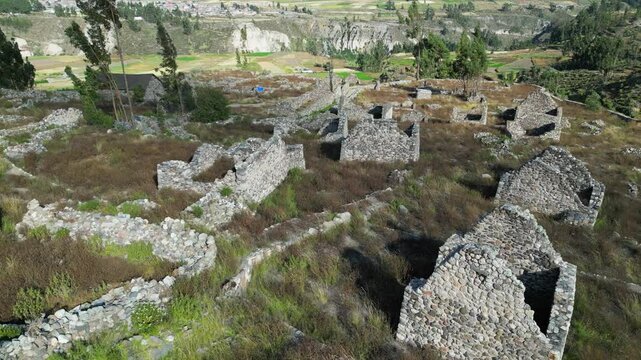 Aerial view of old, abandoned cemetery of Uyo Uyo, valley in Peru