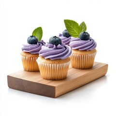 Blueberry cupcakes on a wooden tray, isolated on a white background, rustic and charming.