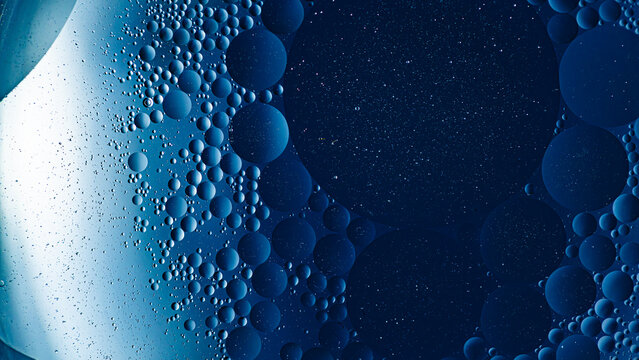 Blue oil bubbles in water