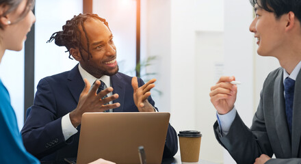 Group of multinational business people meeting in office