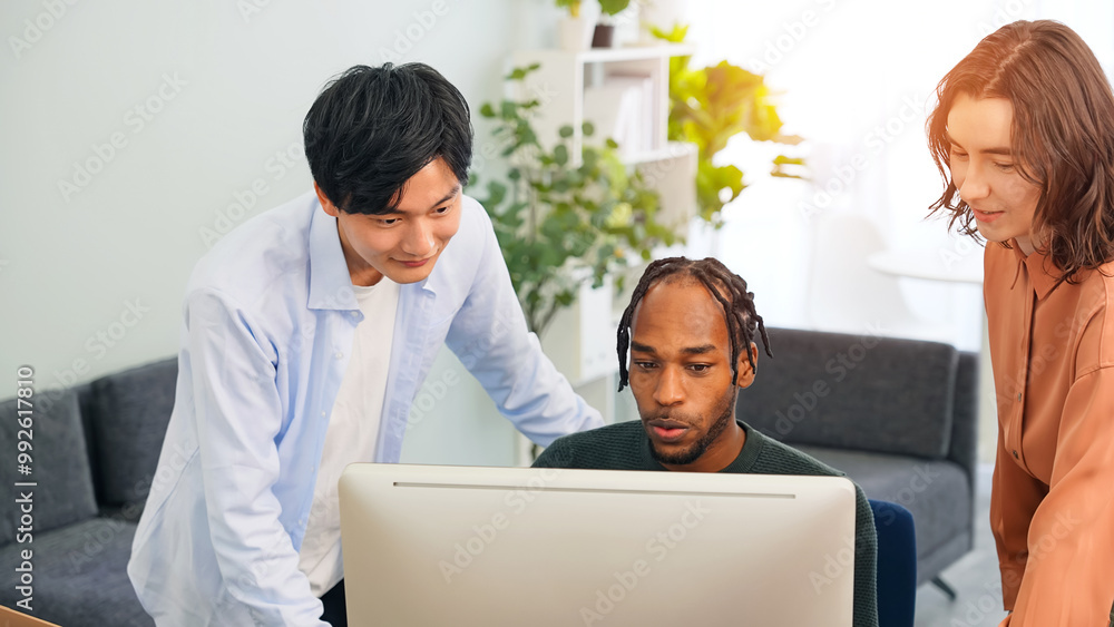 Poster multinational people in casual wear having a meeting about business management while looking at a co