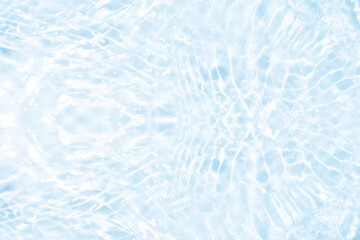 Blue water with ripples on the surface. Defocus blurred transparent blue colored clear calm water...
