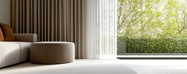 Modern living room featuring a cozy sofa, round table, and large windows with a view of lush greenery, creating a serene atmosphere.