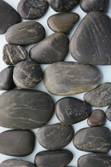 smooth black color stones, simple background
