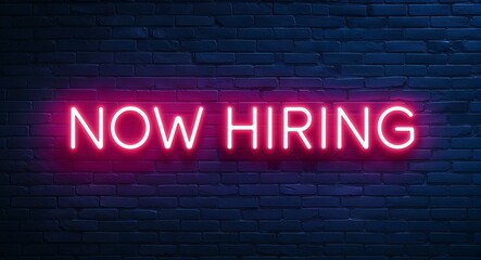 Fototapeta premium now hiring word lettering glowing with neon light on dark brick wall background
