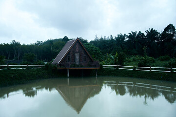 Obraz premium wooden house on the lake